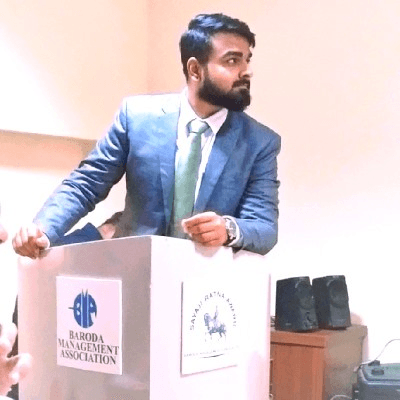 Meet Chavda, Senior Ruby on Rails Developer, at a professional event